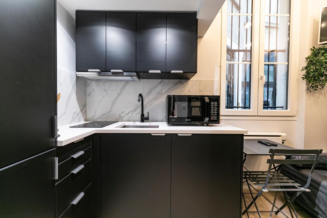 Le studio de belleville 2 à 4 personnes Parigi Esterno foto